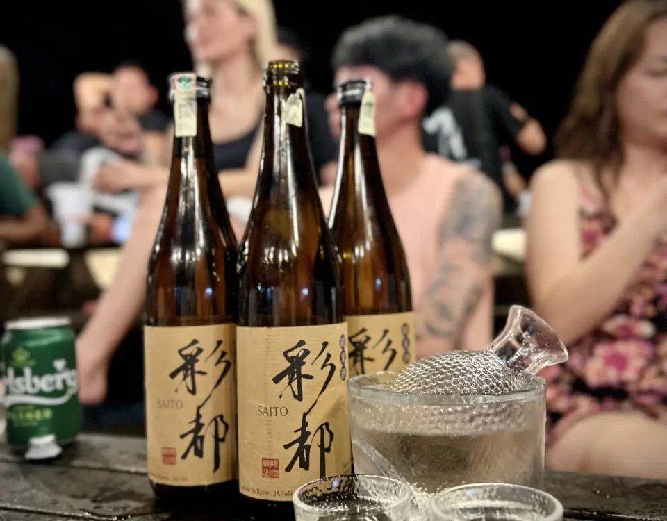 Cherished Moments on Tioman Island Enjoying Sake with Friends