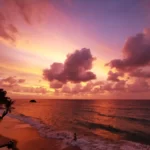 Vibrant Yellow, Orange, and Red Sunset Over Tioman Island