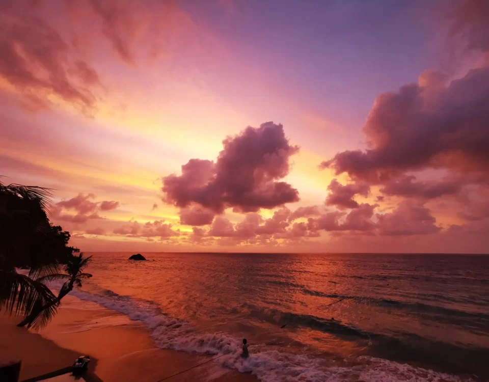 Vibrant Yellow, Orange, and Red Sunset Over Tioman Island